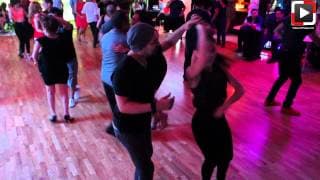 Salomon Amaya y Jessica Szota dancing salsa at Salrica Dance Social