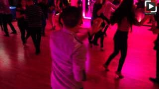 Jessica Szota y Oscar Martinez social dancing at Salsa Dura Houston